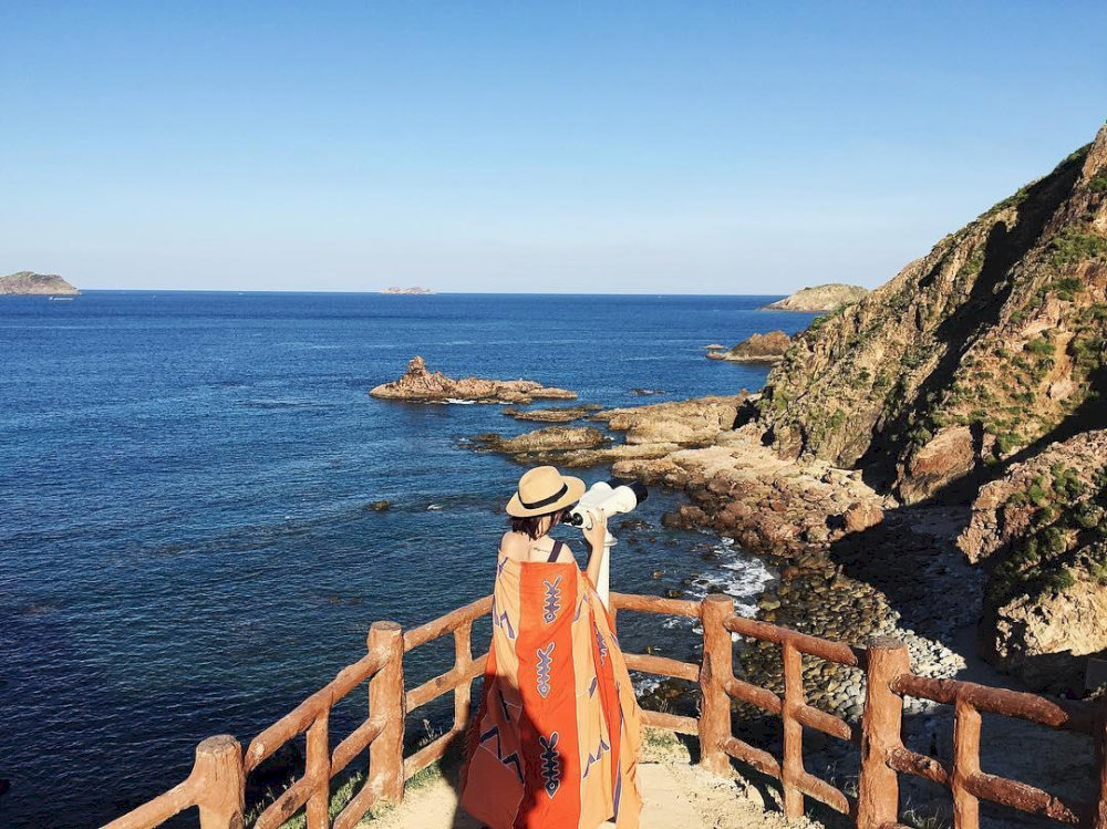 From the walkway, visitors can stop and enjoy the ocean view through a telescope 